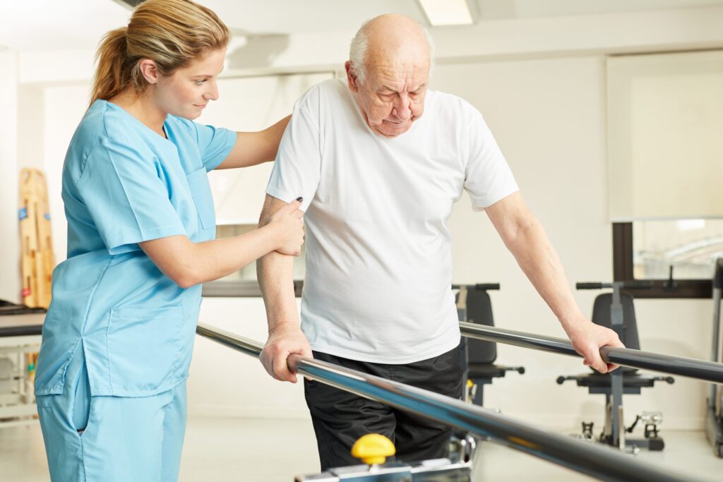 A male resident going through physical therapy as part of his assisted living at Bel Air