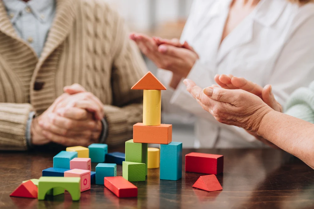 wellness programs designed to support cognitive health Resident participating in wellness programs designed to support cognitive health and independence in today’s memory care communities